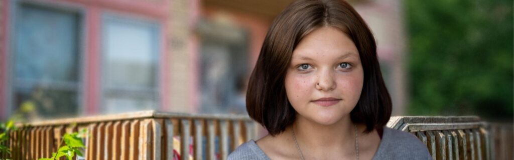 A girl standing outdoors