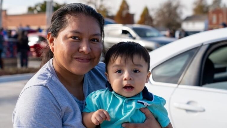 A woman and child at an outdoor event